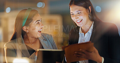 Buy stock photo Laptop, tablet and collaboration with business people at night in the office together for teamwork. Technology, smile and a happy employee team of women working on a project or report in the evening