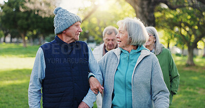 Nature, walk and senior couple of friends bond, support and travel together for retirement wellness. Hug, love and elderly man, old woman or people for outdoor care, freedom or morning journey
