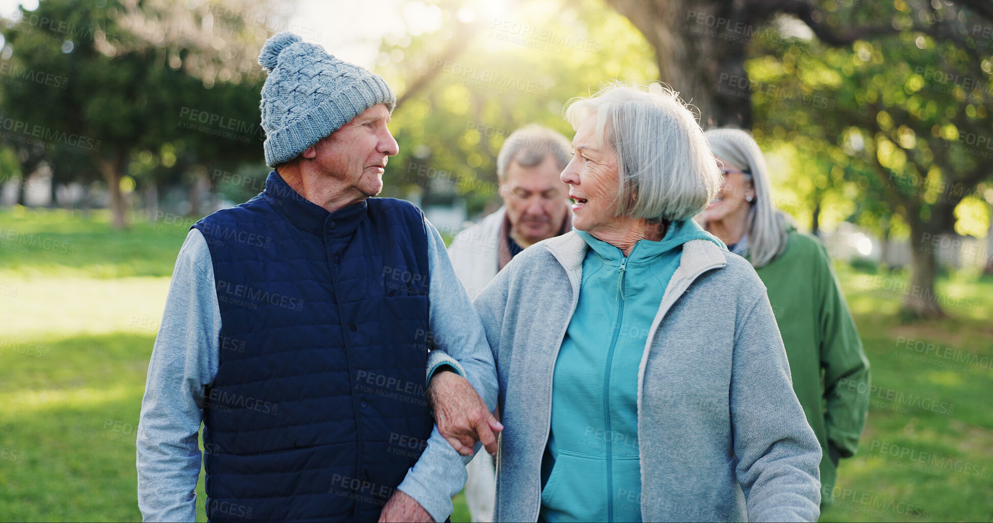 Buy stock photo Nature, walk and senior couple of friends bond, support and travel together for retirement wellness. Hug, love and elderly man, old woman or people for outdoor care, freedom or morning journey