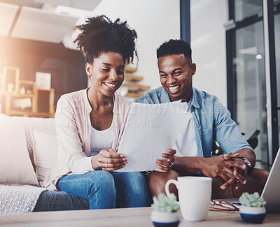 Buy stock photo Finance, laptop and happy couple with paperwork on sofa for bills, tax review or mortgage. Lens flare, document and black man with woman on computer for planning budget, payment or investment in home