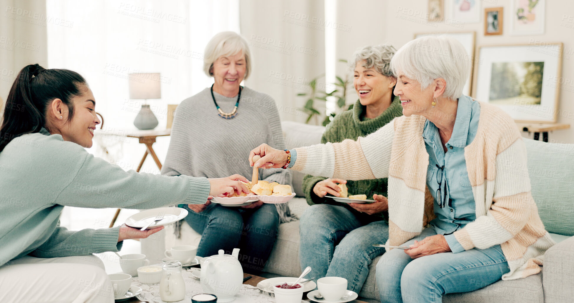 Buy stock photo Senior women, tea and friends at a retirement home for quality time, chat or relax. Elderly people or group with a caregiver at a table for food and social visit while drinking and eating together