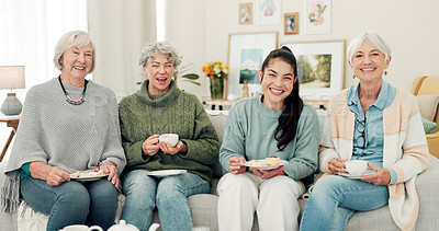 Buy stock photo Senior women, tea and portrait of friends at a retirement home for quality time, chat or relax. Elderly people or group with a happy caregiver on a sofa for food and social visit while funny together