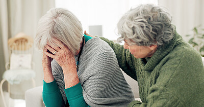 Buy stock photo Empathy, sad and senior woman crying for loss, grief or depression in the living room at home. Mental health, emotions and elderly female person comforting her friend in sorrow for sympathy in house.