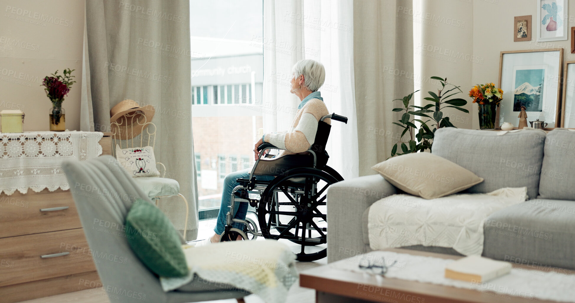 Buy stock photo Senior woman, wheelchair and thinking by window in retirement for dream, memory or remember at home. Elderly female or person with a disability sitting and looking out glass at the city in the house