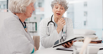 Senior doctor, tablet and talking to patient for healthcare prescription or diagnosis at hospital. Mature medical professional consulting elderly female person on technology for help advice at clinic