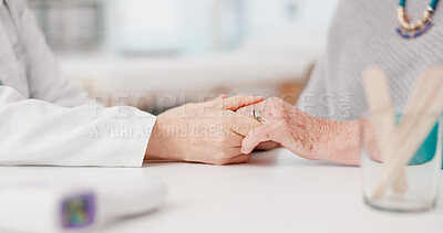 Buy stock photo Senior woman, doctor and holding hands with patient in elderly care, love or consultation at the hospital. Closeup of medical professional touching hand for healthcare trust, support or appointment