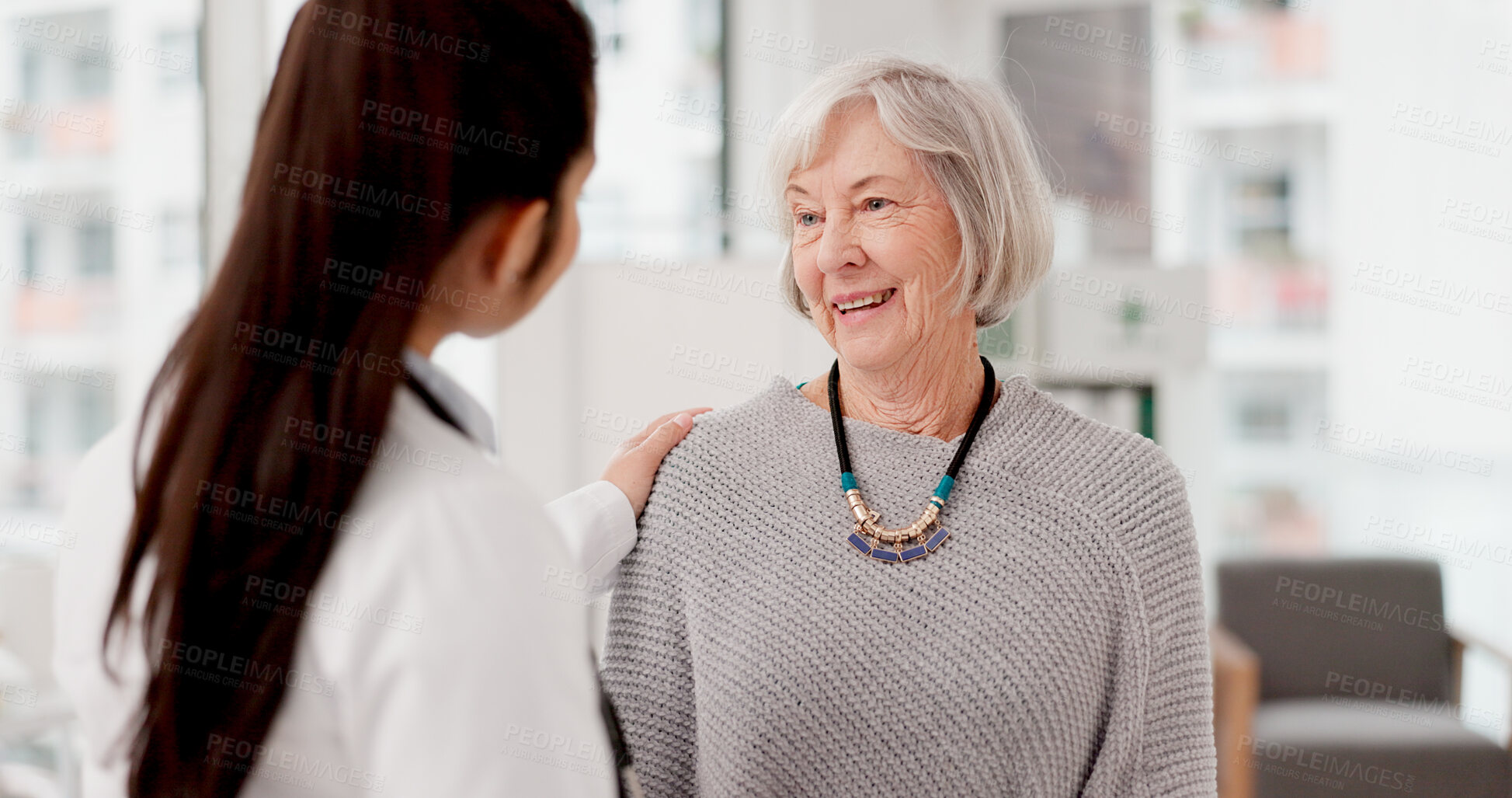 Buy stock photo Healthcare, shoulder pain and an old woman with her doctor in the hospital, talking during a consultation. Medical, insurance or anatomy and a senior patient in a clinic with a medicine professional