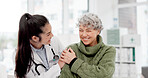 Happy, care and face of a doctor with a woman for medical trust, healthcare and help. Laughing, hug and portrait of a young nurse with a senior patient and love during a consultation at a clinic