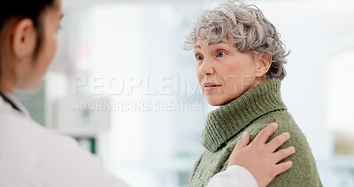 Medical, shoulder pain and an old woman with her doctor in the hospital, talking during a consultation. Healthcare, insurance or anatomy and a senior patient in a clinic with a medicine professional