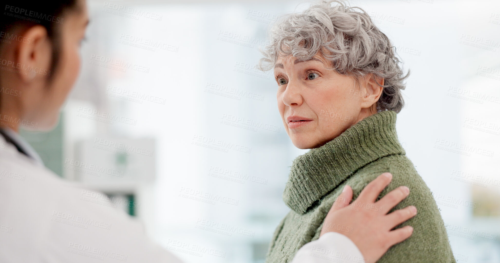 Buy stock photo Medical, shoulder pain and an old woman with her doctor in the hospital, talking during a consultation. Healthcare, insurance or anatomy and a senior patient in a clinic with a medicine professional