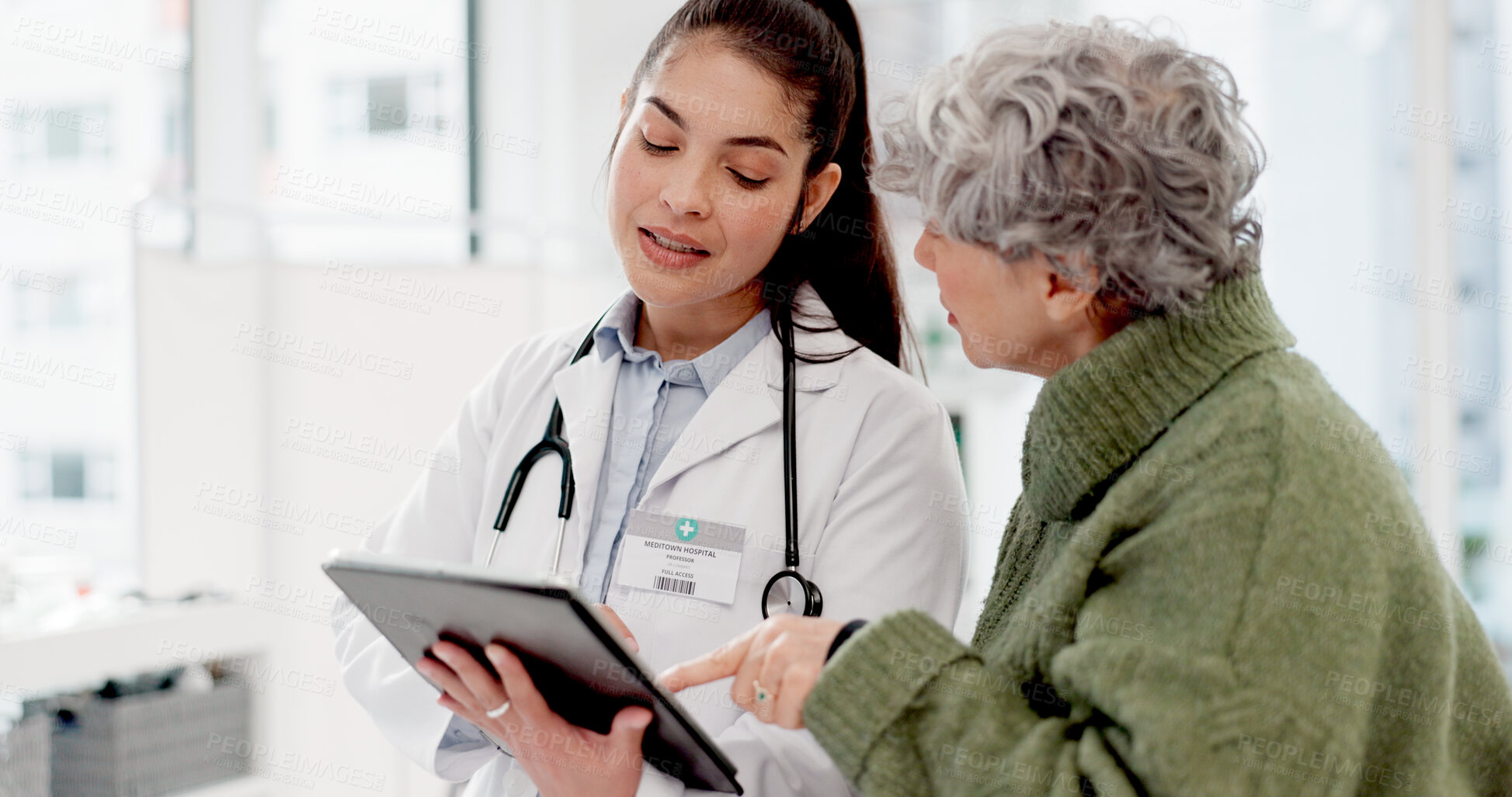 Buy stock photo Results, tablet or doctor with senior patient in consultation for healthcare advice or checkup at hospital. News, online or medical worker talking to elderly woman in meeting appointment for medicare