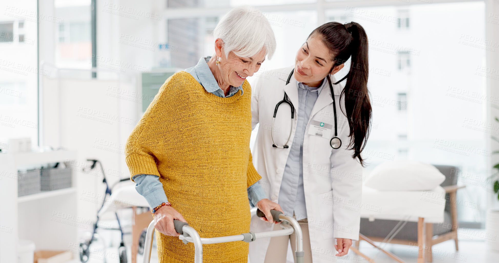 Buy stock photo Elderly woman, doctor and physiotherapy with walker for support, help and healthcare. Walking frame, medical professional and happy person with a disability in rehabilitation for physical therapy