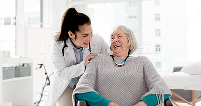 Buy stock photo Face, laughing or doctor with senior patient in consultation for healthcare nursing or checkup in hospital clinic. Portrait, hug or happy nurse smiling with a funny old woman in medical appointment