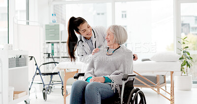 Happy, senior care and woman with a disability and doctor for healthcare, support and consulting. Smile, love and face portrait of a medical employee and elderly patient in a wheelchair at a clinic