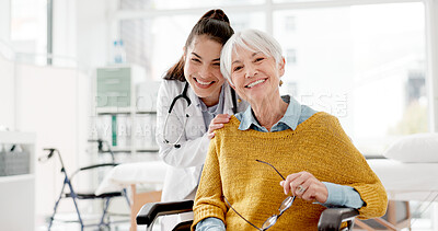 Face, happy or doctor with old woman In wheelchair or consultation for healthcare in hospital clinic. Portrait, smile or medical worker consulting an elderly person with a disability in appointment
