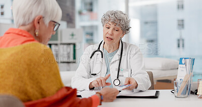 Buy stock photo Senior woman, doctor and consulting patient with pamphlet for information, quotation or service at hospital. Mature medical professional talking and explaining healthcare advice or life insurance