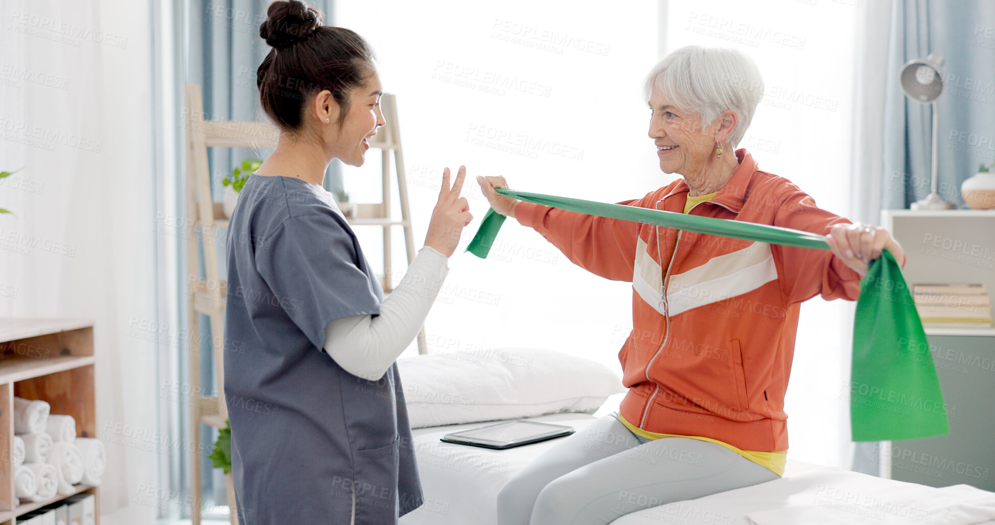 Buy stock photo Elderly woman doing exercise with a resistance band for physical therapy with nurse in clinic. Fitness, healthcare and female patient doing arm workout with a physiotherapist in rehabilitation center
