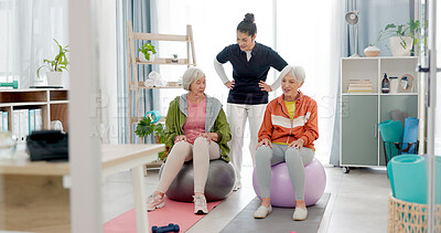 Senior people, fitness class and coach with tablet, ball and dumbbell for muscle health support or balance. Exercise, training and workout woman and personal trainer in pilates class helping clients