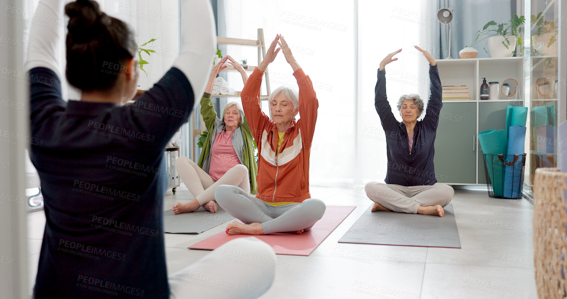 Buy stock photo Senior people, yoga class and coach in meditation, lotus and prayer hands for exercise, holistic wellness and stretching. Workout, peace and calm of elderly woman, clients and zen personal trainer