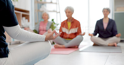 Senior women, yoga group and coach in meditation, peace and prayer hands in exercise, holistic wellness and mindfulness. Spiritual workout, class and calm elderly people, clients and personal trainer