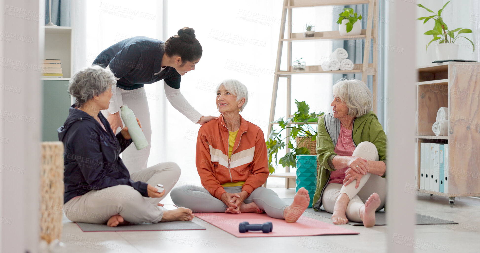 Buy stock photo Senior woman, exercise group and personal trainer on floor, home and talk for training advice, workout or health. Elderly lady, team and fitness coaching with chat, drinking water and relax in house