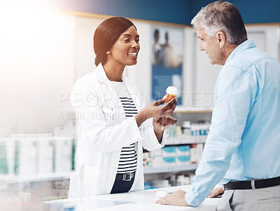 Buy stock photo Pills, explaining and pharmacist with man by counter for prescription medication for treatment. Discussion, medicine and female healthcare worker with mature patient for tablets in drugstore chemist.