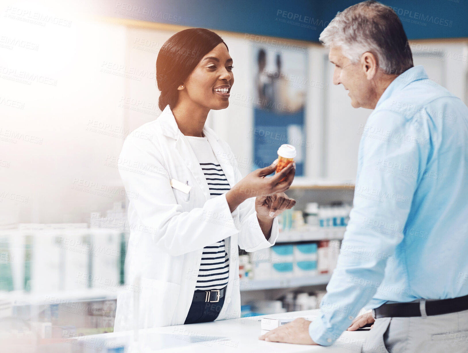 Buy stock photo Pills, explaining and pharmacist with man by counter for prescription medication for treatment. Discussion, medicine and female healthcare worker with mature patient for tablets in drugstore chemist.