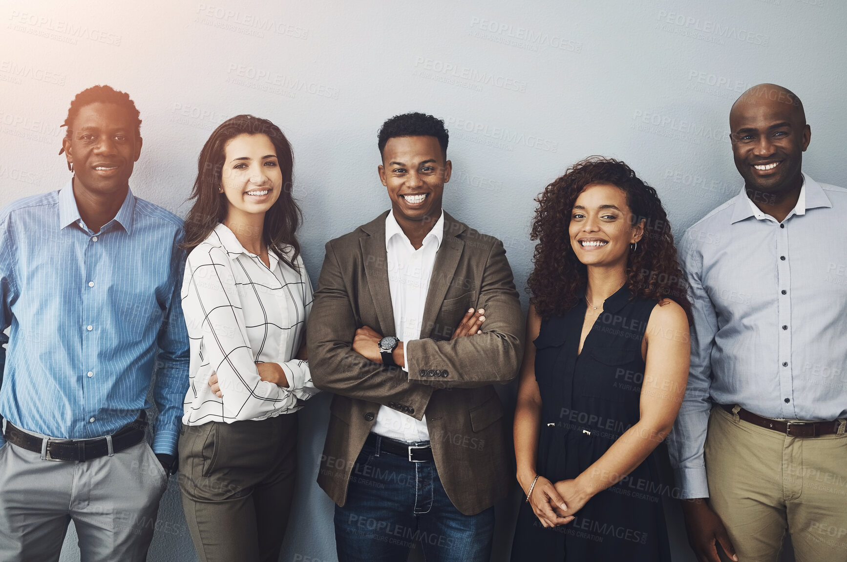 Buy stock photo Happy business people, portrait and confidence with team in row, line or diversity on a wall background. Group of young employees with smile in confidence for inclusion, community or support in unity