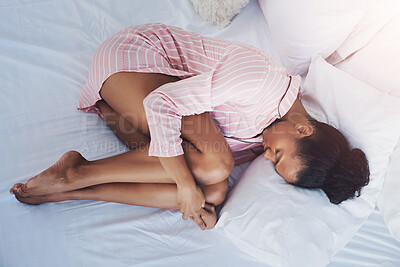 Buy stock photo Tired girl, sleeping and bed with pillow above in depression, loneliness or insomnia at home. Top view of young female person asleep in pajamas for morning, rest or fatigue in bedroom alone at house