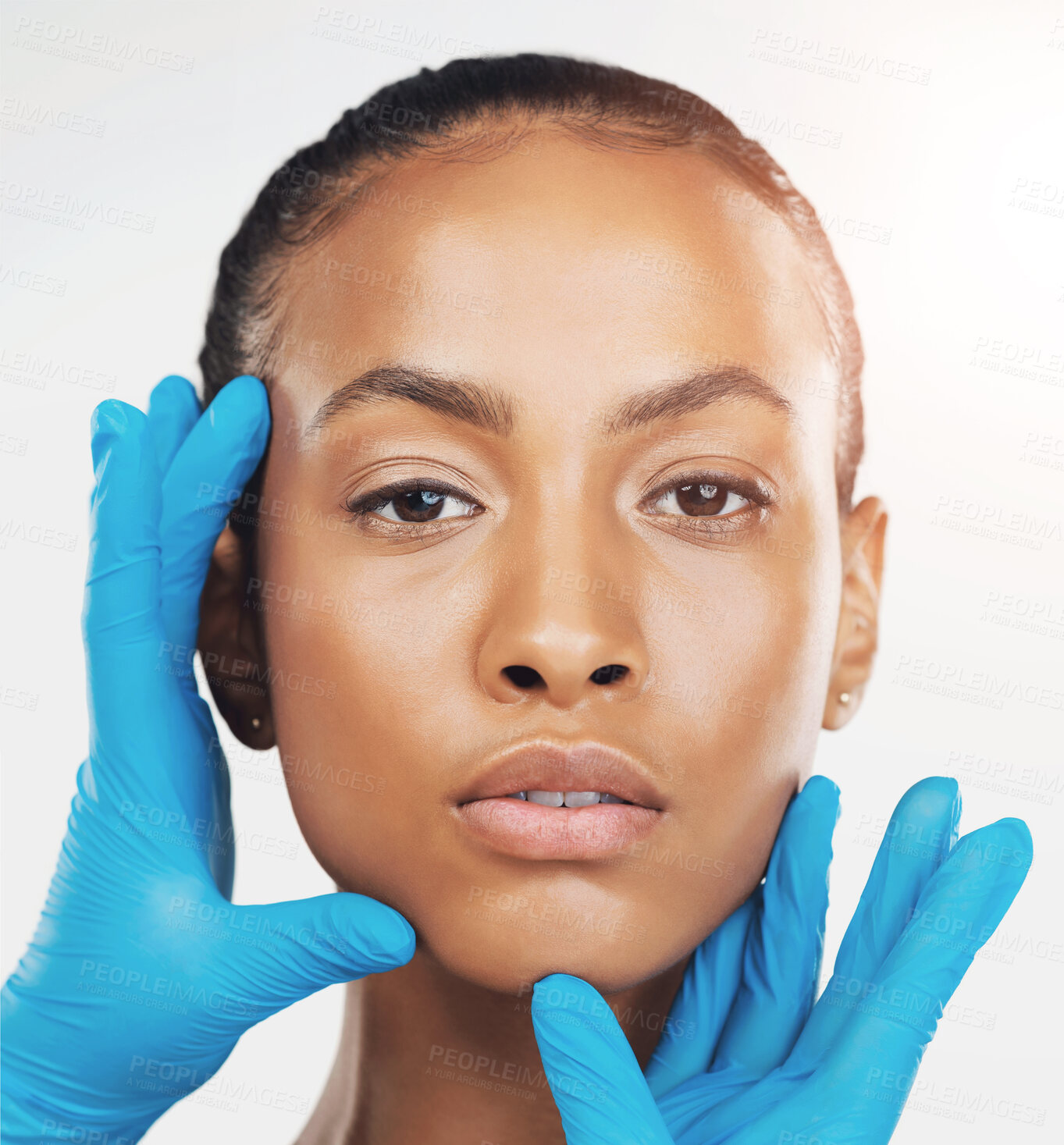 Buy stock photo Woman, portrait and surgical gloves in studio for plastic surgery, beauty or facial treatment on a white background. Face of female person with hands for medical, clinical or skincare enhancement