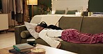 Woman, tired and sleeping on sofa in home with dreaming, morning nap and rest for relax in living room. Person, exhausted or fatigue on pillow or couch with burnout, overworked or depression in house