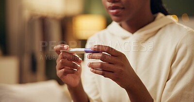 Home, hands and woman with pregnancy test, surprise and frustrated with results, info and mistake. Closeup, person and girl in lounge, stress and overwhelmed with depression and regret with test kit