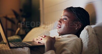 Buy stock photo Bed, watch and black woman on laptop for movie streaming service, film or comedy at night. Girl at home relax in bedroom with computer for online TV show, series and funny video on weekend or holiday