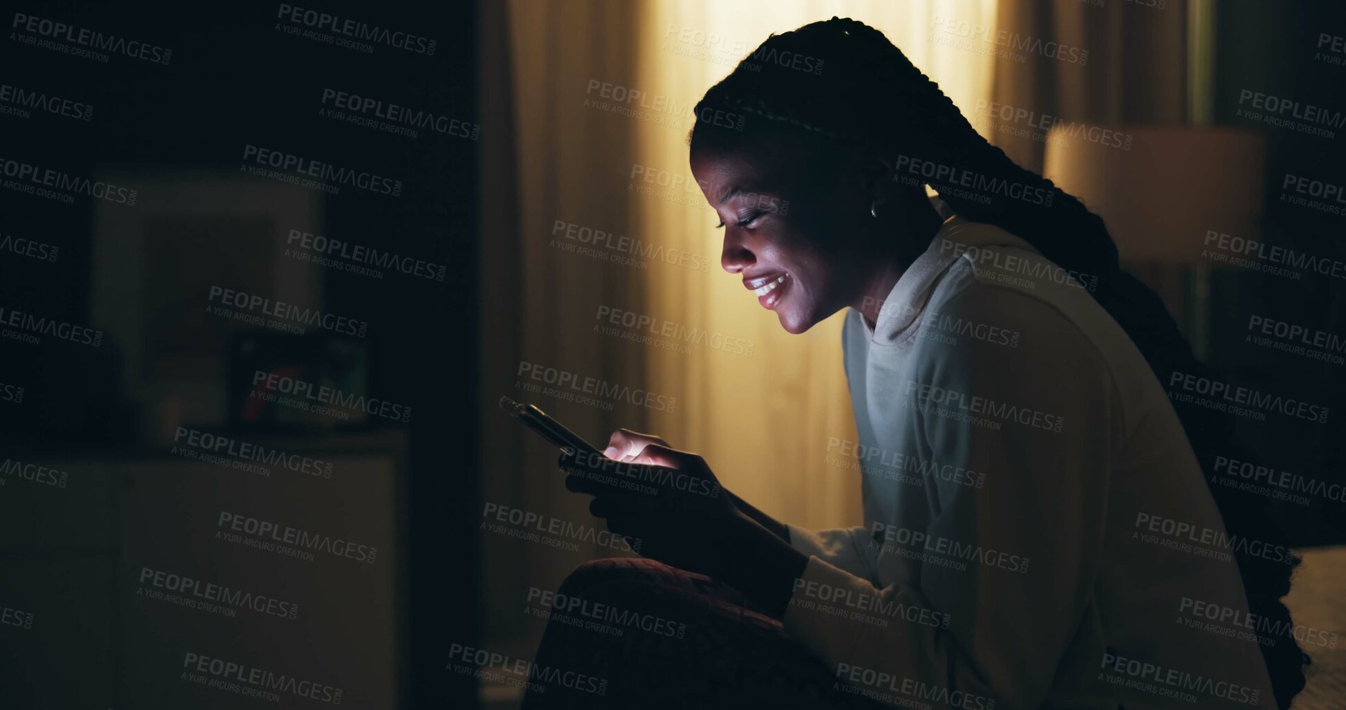 Buy stock photo Funny, girl and night in home with phone notification and watch online video on social media or chat. Reading, news and woman scroll smartphone with insomnia, late and relax on internet or app