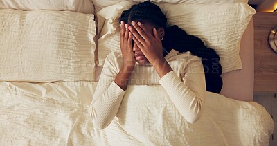 Buy stock photo Tired, woman and wake up with depression in bed and frustrated by stress or anxiety in morning. Headache, fatigue and high angle of girl in bedroom with mental health crisis and thinking of burnout