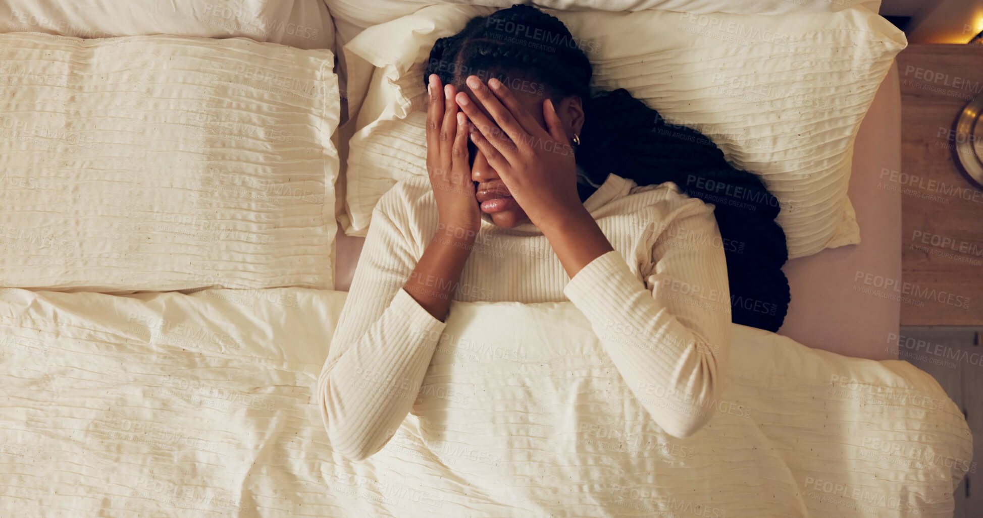 Buy stock photo Tired, woman and wake up with depression in bed and frustrated by stress or anxiety in morning. Headache, fatigue and high angle of girl in bedroom with mental health crisis and thinking of burnout