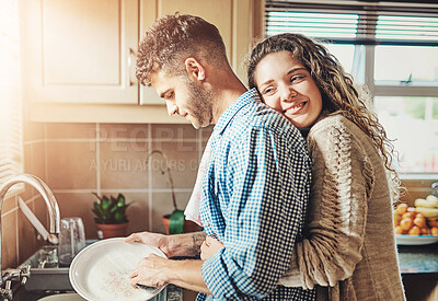 Buy stock photo Cleaning, hug and man washing dishes with woman at kitchen sink for hygiene, germs or bonding together. Embrace, support and happy couple with chores for dirt, disinfect or housework in home