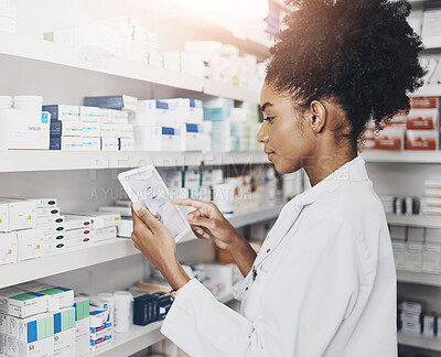 Buy stock photo African woman, check or tablet with screen in pharmacy for stock inspection, report for medicine inventory. Female pharmacist, drug store and ebook for digital record of health info or pills research