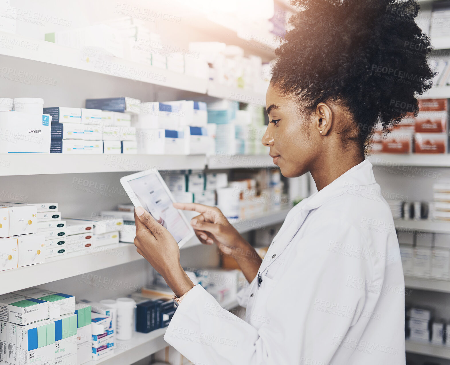 Buy stock photo African woman, check or tablet with screen in pharmacy for stock inspection, report for medicine inventory. Female pharmacist, drug store and ebook for digital record of health info or pills research