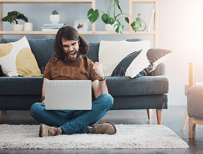 Buy stock photo Home, floor and man with celebration by laptop for online trading, winning and foreign exchange. Happy, person and hand in fist in living room for finance success, investment or break in stock market