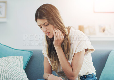 Buy stock photo Home, sofa and woman with toothache or mouth in pain for dental problem and discomfort of cavity. Frustrated, sore and person with sensitive tooth for wisdom teeth, inflammation and oral infection