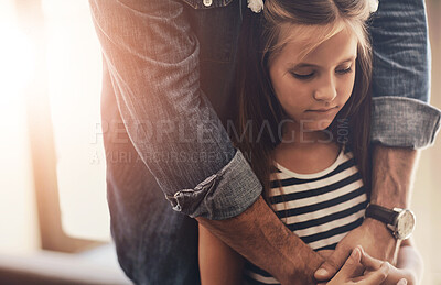 Buy stock photo Girl, child and sad with hands for comfort in home for emotional support, hug and console with parenting. Family, kid and person with embrace for security, safety and crisis with compassion in house