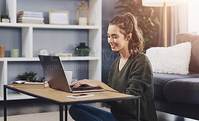 Buy stock photo Education, table and girl with laptop on floor for studying, assignment or literature essay in living room. Online, college student and woman with computer for typing, knowledge or learning in home