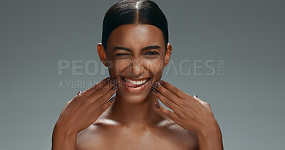 Buy stock photo Skincare, happy and face of Indian woman on gray background for facial, beauty and wellness in studio. Dermatology, emoji and portrait of person for natural cosmetics, makeup and glow for salon