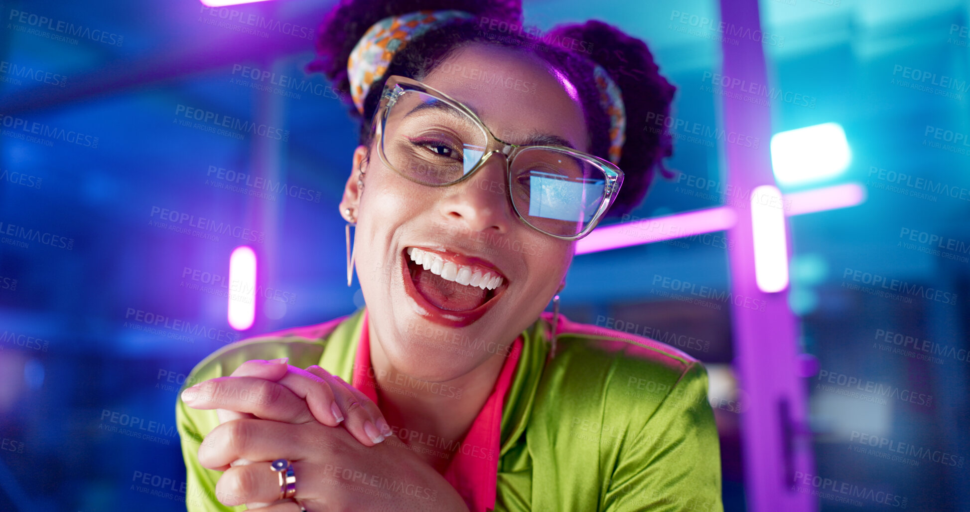 Buy stock photo Face, computer and neon with programmer woman in office at night for coding or developing. Portrait, smile or happy young game developer sitting at desk in workplace with virtual system update