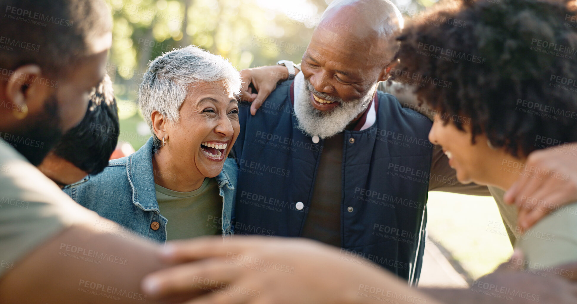 Buy stock photo Huddle, happy and group of people outdoor with collaboration, teamwork and solidarity for charity work. Hug, smile and volunteer or ngo in park with cooperation, community and together for donation
