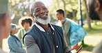 Park, black man and volunteers planning with tablet for support, community project or nature sustainability. Humanitarian, recycling or senior leader in charity service or NGO for pollution cleanup