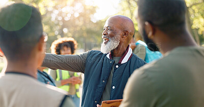 Buy stock photo Park, black man and volunteers discussion with tablet for support, community project or nature sustainability. Humanitarian, recycling or senior leader in charity service or NGO for pollution cleanup