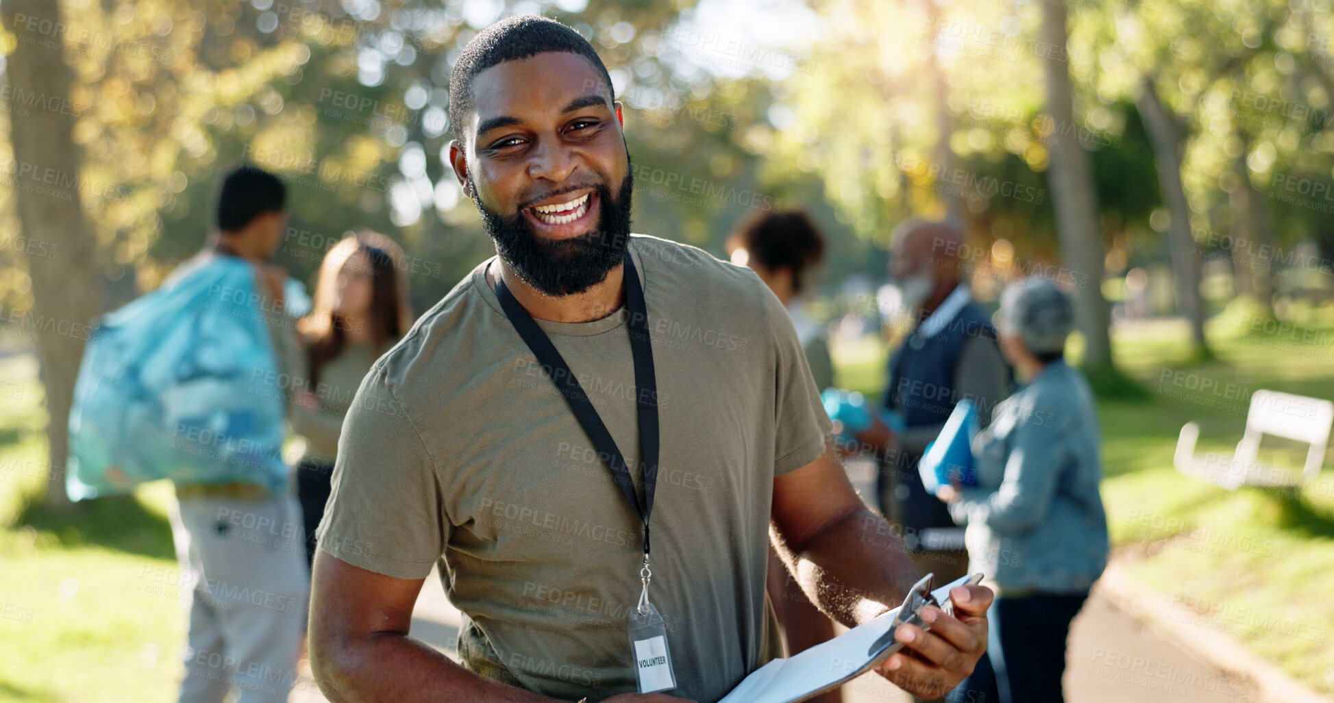 Buy stock photo Man, volunteer and happy portrait with clipboard in nature, supervisor and environment sustainability project with group. Recycle, waste management and cleaning outside trash, help and ngo support