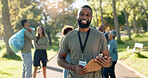 Man, volunteer and smile portrait with clipboard in nature, leadership and environment sustainability project with group. Recycle, waste management and cleaning outside trash, help and ngo support